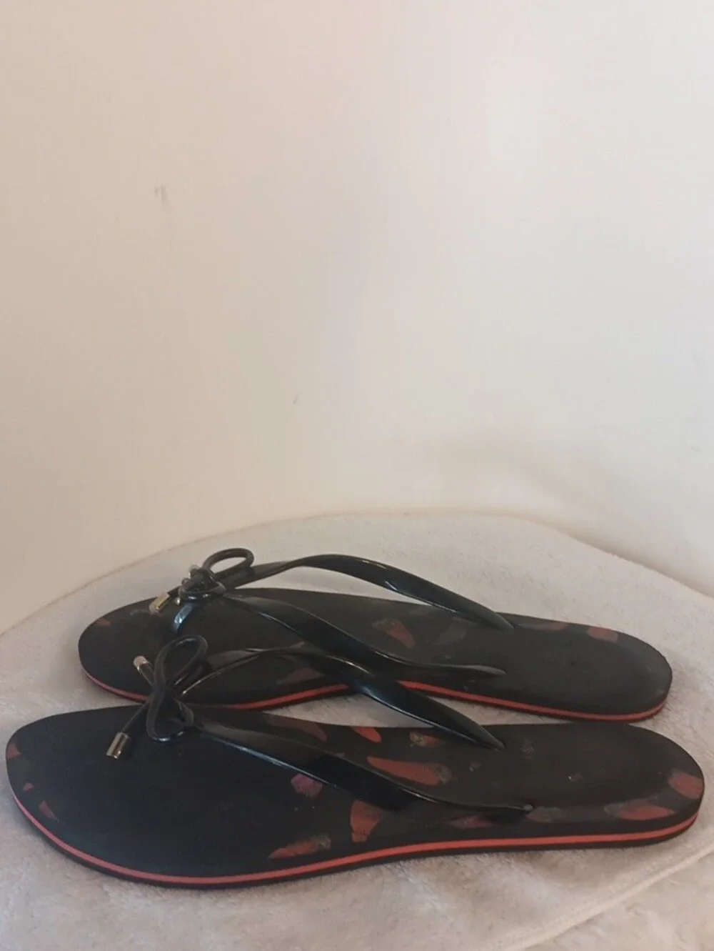 kate spade Black Flip Flop Sandals with Red Pepper Print and Bow